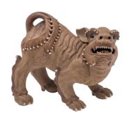 A Japanese Bizen pottery figure of a shishi: modelled in aggressive pose, late Meiji, 18cm high.