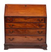 A George III mahogany bureau, circa 1780,