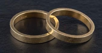 Two 18ct gold band rings,: with partial hallmarks for Birmingham, ring size O1/2, total weight ca.