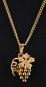 Two 9ct gold pendants,: including a bunch of grapes with import marks for London, 1980, length ca.