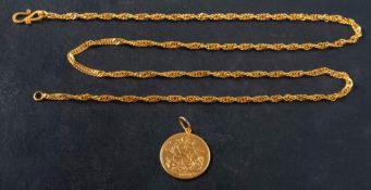 A George V gold sovereign coin pendant, 1927,: diameter 22mms, weight ca. 8.