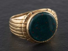 A 9ct gold bloodstone signet ring,: with hallmarks for London, 1964, length of ring head ca. 1.