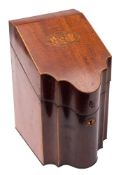 A 19th century mahogany and inlaid knife box: of serpentine outline,