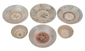 A group of four Chinese blue and white provincial dishes and two similar bowls: decorated with