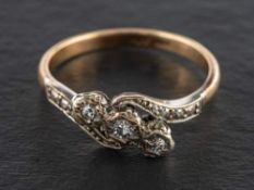 A single-cut diamond, three-stone ring,: estimated total diamond weight ca 0.