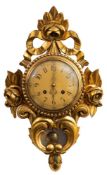 A 20th century gilt-wall clock: the eight-day duration movement striking the hours on a bell,