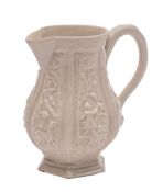 A Staffordshire white saltglaze cream jug: of octagonal baluster form with loop handle,