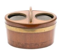 A 19th century mahogany and brass bound wine cooler: of oval outline,