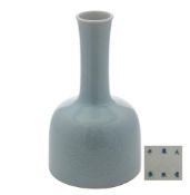 A Chinese anhua decorated mallet-shaped vase: with tall gently flaring neck,