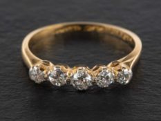 An old-cut diamond five-stone ring,: estimated total diamond weight ca. 0.