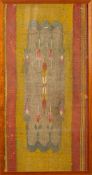 A Turkish fabric remnant: with floral pole medallion and flowerhead decoration, to a green ground,