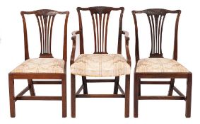 A set of eight mahogany and upholstered dining chairs in George III style, late 19th century,