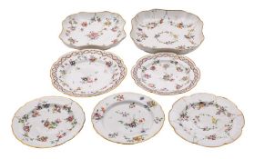 A group of seven Bristol plates and dessert dishes: painted with floral sprays,