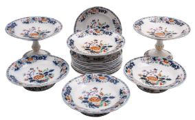 A Copeland 'chinoiserie' pottery part dessert service: transfer printed with peony and other floral
