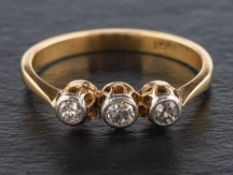 A single and old-cut diamond, three-stone ring,: estimated total diamond weight ca. 0.