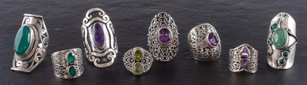 Eight gemset rings,: including amethyst, green chalcedony, aventurine quartz and peridot,