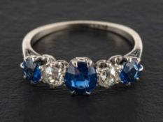A sapphire and old-cut diamond, five-stone ring,: estimated total diamond weight ca. 0.