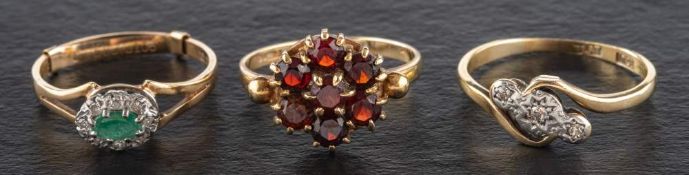 Three gemset cluster rings,