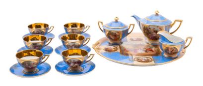 An Austrian porcelain cabaret set: comprising a circular tray, teapot and cover, sucrier and cover,