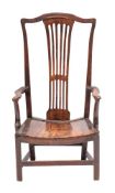 A George III ash, elm and oak elbow chair, circa 1765,