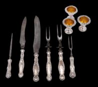 A matched silver handled carving set, stamped Sterling: includes two carving knives,