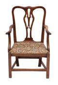 A George III mahogany elbow chair, circa 1770,