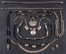 A collection of nine bead necklaces,: eight Indian, one African and a clasp, lengths ca. 39-57cm.