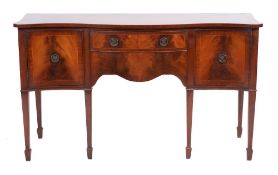 A mahogany and line inlaid serpentine front sideboard in George III style, by Rackstraw,