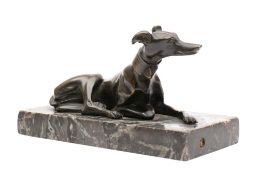 A 19th century bronze study of a reclining whippet: wearing a collar, unsigned,