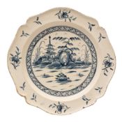 An English blue and white creamware serving dish: with scalloped rim,