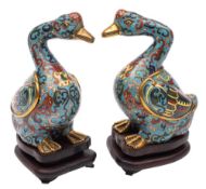 A pair of Chinese cloisonne geese censers and covers: decorated with mythical beasts and masks