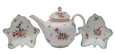 A Bristol polychrome bullet-shaped teapot and cover and a pair of similar leaf-shaped pickle dishes,