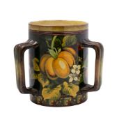 A Doulton Lambeth faience tyg: the exterior painted with fruiting plum and blossom,