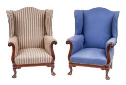 A pair of Victorian mahogany and upholstered wing armchairs in George II style, late 19th century,