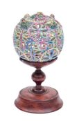 An unusual Chinese famille rose porcelain cricket cage: in the form of a reticulated brocade ball