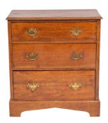 An oak chest of drawers in George III style, late 19th / early 20th century,