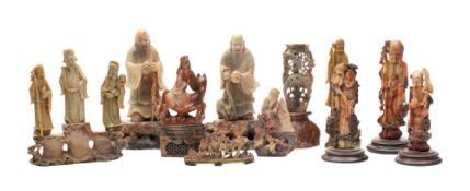 A group of late 19th Century Chinese soapstone carvings: including figures of Immortals and a vase