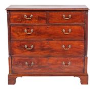 A Regency mahogany chest of drawers, circa 1815,: the top with moulded front and side edges,