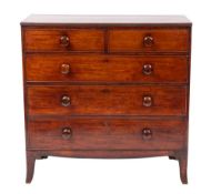 A late George III mahogany chest of drawers, circa 1800,; the top with reeded edges,