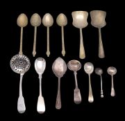 A small collection of silver and plated flatware: includes silver sifting spoon,
