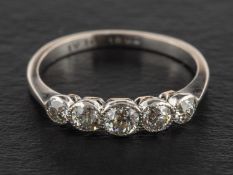An old-cut diamond five-stone ring,: estimated total diamond weight ca. 0.