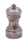 A French silver pepper mill, stamped marks:, of waisted outline with fluted decoration,