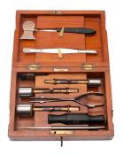 Arnold and Sons, London, an English trepanning set: includes three steel and brass trephines,