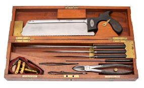 Arnold & Sons an ebony handled amputation set: with three various knives with almost as new steel