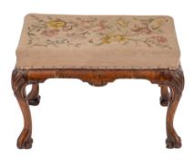 A walnut and needlework tapestry upholstered stool in Queen Anne taste, 19th century,