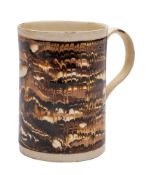 An English creamware cylindrical mug: with grooved loop handle,