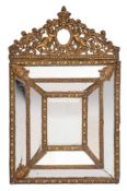 A Dutch repousse brass framed marginal wall mirror, in 17th century style, late 19th century,