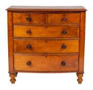 A Victorian mahogany bowfront chest of drawers, circa 1860,: the top with moulded edges,