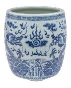 A large Chinese blue and white 'dragon' jardiniere/fish bowl: of barrel form with lipped rim,