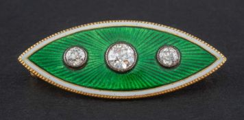 A late 19th century, gilded silver, green and white enamel, navette-shaped brooch,